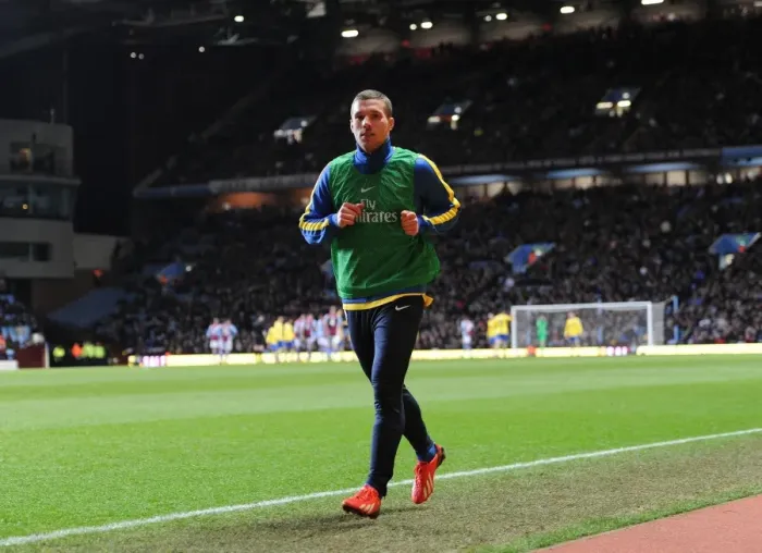 Framed Print : Arsenal's Lukas Podolski Warming Up Ahead of Aston Villa Clash, 2014 Premier League