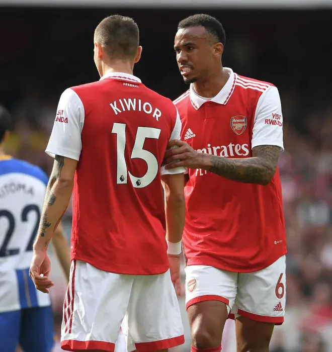 Framed Print : Arsenal's Magalhaes and Kiwior in Action against Brighton in 2022-23 Premier League