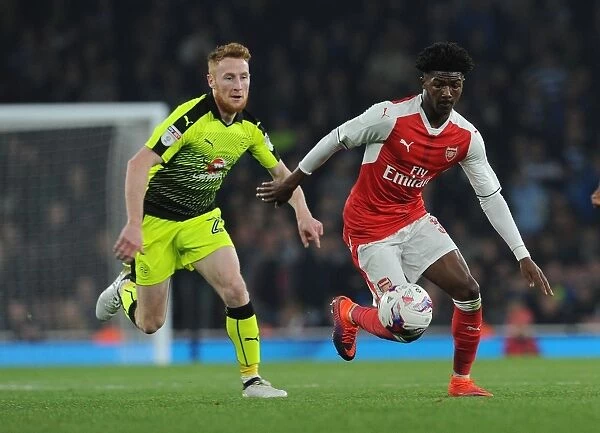 Arsenal's Maitland-Niles Clashes with Reading's Quinn in EFL Cup Showdown