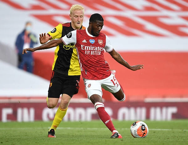 Arsenal's Maitland-Niles Outmaneuvers Watford's Hughes in Premier League Clash
