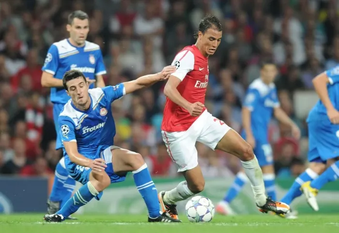 Framed Print : Arsenal's Marouane Chamakh Clashes with Olympiacos Ivan Marcano in 2011 Champions League Showdown Framed Print : Arsenal's Marouane Chamakh Clashes with Olympiacos Ivan Marcano in 2011 Champions League Showdown