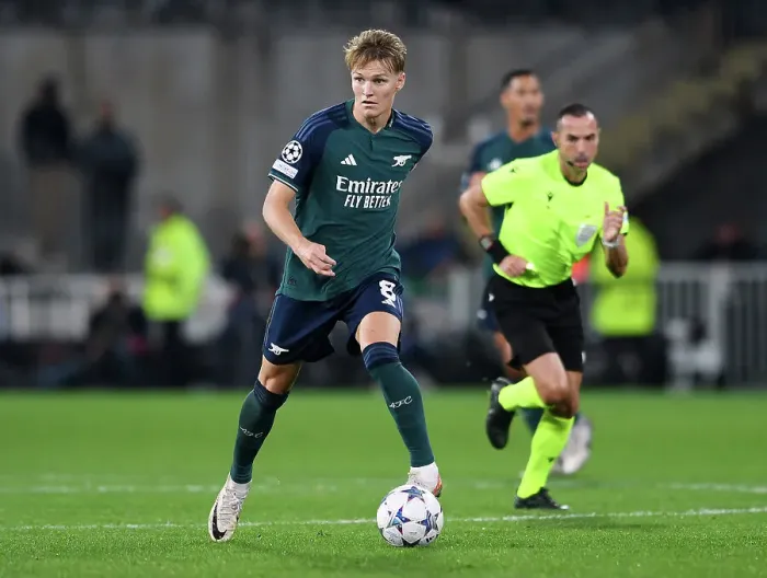 Framed Print : Arsenal's Martin Ødegaard in Action against RC Lens in 2023-24 UEFA Champions League Framed Print : Arsenal's Martin Ødegaard in Action against RC Lens in 2023-24 UEFA Champions League