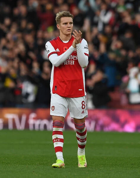 Arsenal's Martin Odegaard Celebrates with Fans after Arsenal v Watford Win