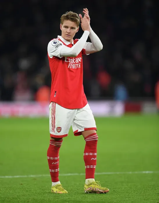 Framed Print : Arsenal's Martin Odegaard Celebrates with Fans after Arsenal vs Manchester United Win, Premier League 2022-23 Framed Print : Arsenal's Martin Odegaard Celebrates with Fans after Arsenal vs Manchester United Win, Premier League 2022-23