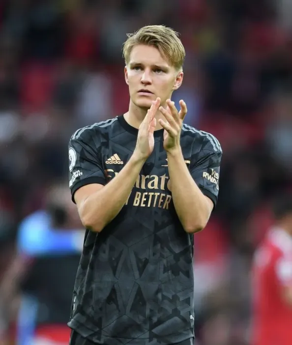 Framed Print : Arsenal's Martin Odegaard Celebrates with Fans after Manchester United Victory - Premier League 2022-23