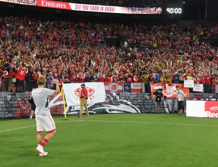 Framed Print : Arsenal's Martin Odegaard Celebrates with Fans after Pre-Season Victory over Everton Framed Print : Arsenal's Martin Odegaard Celebrates with Fans after Pre-Season Victory over Everton