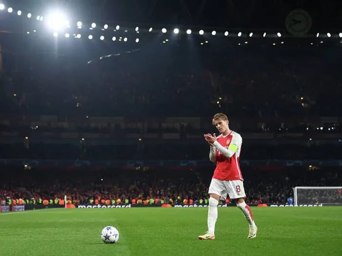 Framed Print : Arsenal's Martin Odegaard Celebrates with Fans vs. RC Lens in 2023-24 UEFA Champions League