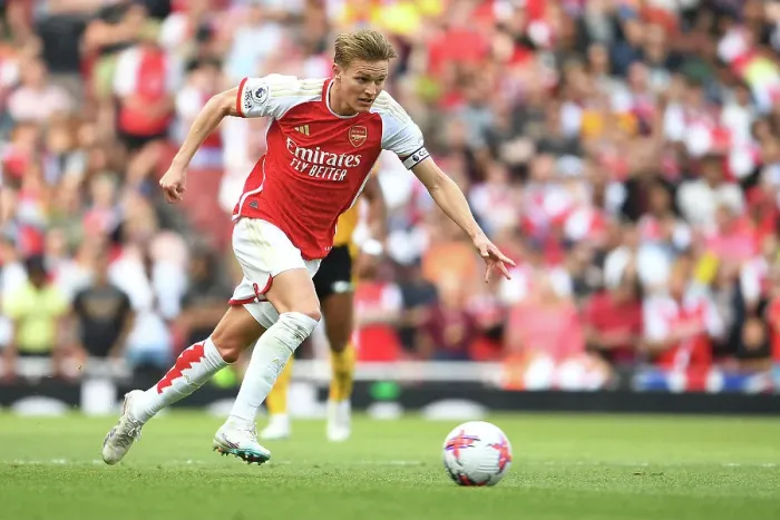 Framed Print : Arsenal's Martin Odegaard Charges Forward Against Wolverhampton Wanderers in 2022-23 Premier League Clash Framed Print : Arsenal's Martin Odegaard Charges Forward Against Wolverhampton Wanderers in 2022-23 Premier League Clash