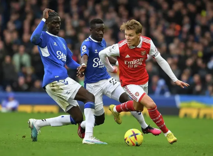 Framed Print : Arsenal's Martin Odegaard Clashes with Everton's Amadou Onana in Premier League Showdown Framed Print : Arsenal's Martin Odegaard Clashes with Everton's Amadou Onana in Premier League Showdown