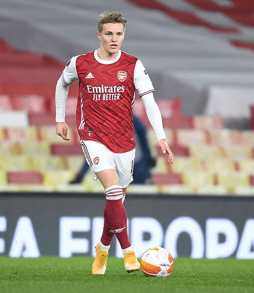 Arsenal's Martin Odegaard in Europa League Action Against Olympiacos at Empty Emirates Stadium