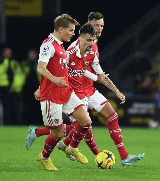 Arsenal's Martin Odegaard, Fabio Vieira, and Ben White in Action against Wolverhampton Wanderers (2022-23)