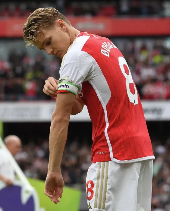 Framed Print : Arsenal's Martin Odegaard Faces Off Against Tottenham in the 2023-24 Premier League Showdown at Emirates Stadium