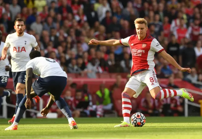 Framed Print : Arsenal's Martin Odegaard Faces Off Against Tottenham in Premier League Showdown