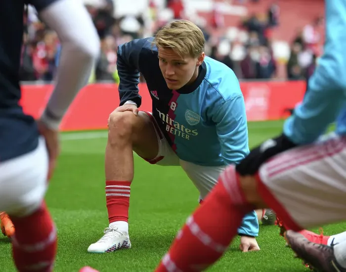 Framed Print : Arsenal's Martin Odegaard Gears Up for Arsenal v Brentford Premier League Clash at Emirates Stadium
