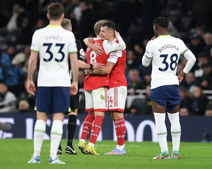 Framed Print : Arsenal's Martin Odegaard and Granit Xhaka in Action Against Tottenham Hotspur in the Premier League Framed Print : Arsenal's Martin Odegaard and Granit Xhaka in Action Against Tottenham Hotspur in the Premier League