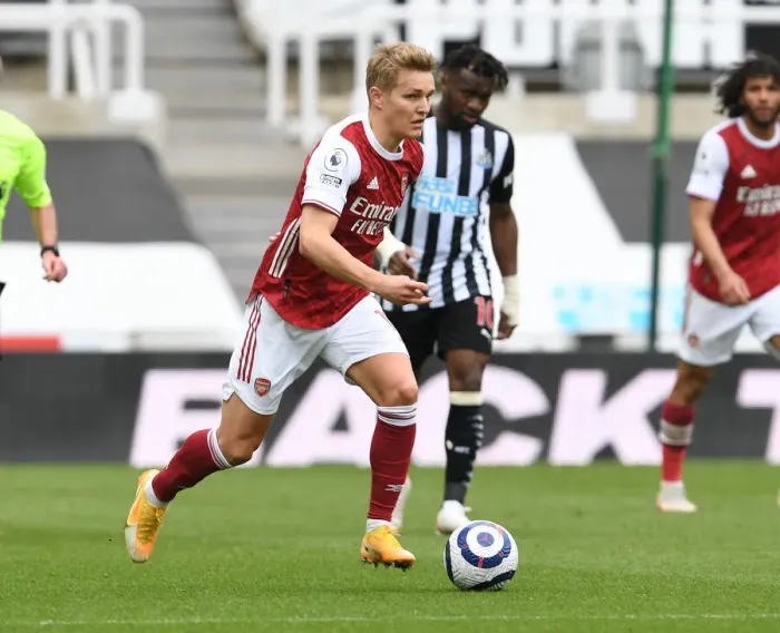 Framed Print : Arsenal's Martin Odegaard at Newcastle United: Premier League Clash Amidst Empty St. James Park (2020-21)