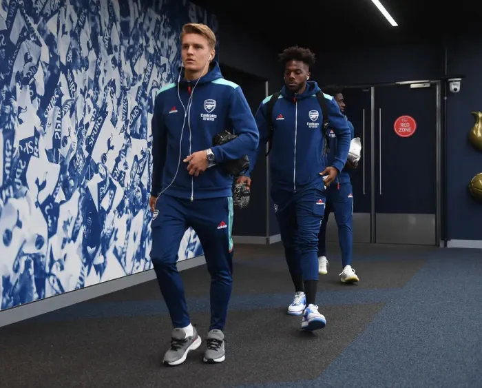 Framed Print : Arsenal's Martin Odegaard and Nuno Tavares Face Off Against Tottenham Hotspur in Premier League Clash