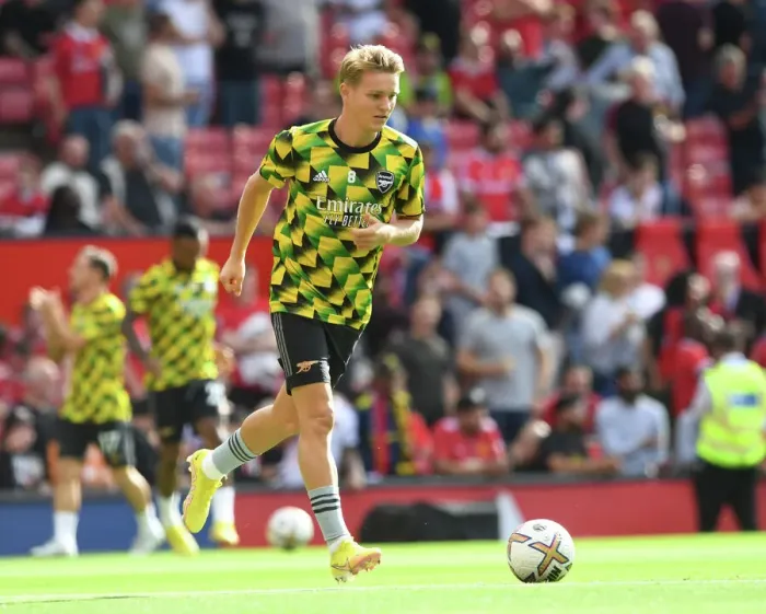 Framed Print : Arsenal's Martin Odegaard Prepares for Battle: Arsenal vs. Manchester United (2022-23 Premier League)
