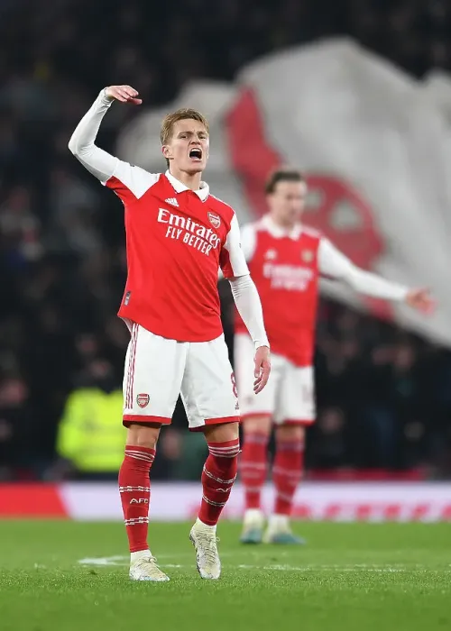 Framed Print : Arsenal's Martin Odegaard Rallies Fans Amidst Arsenal FC vs Southampton FC Tussle, Premier League 2022-23