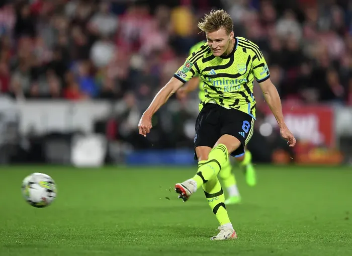 Framed Print : Arsenal's Martin Ødegaard Scores in Carabao Cup Clash Against Brentford Framed Print : Arsenal's Martin Ødegaard Scores in Carabao Cup Clash Against Brentford