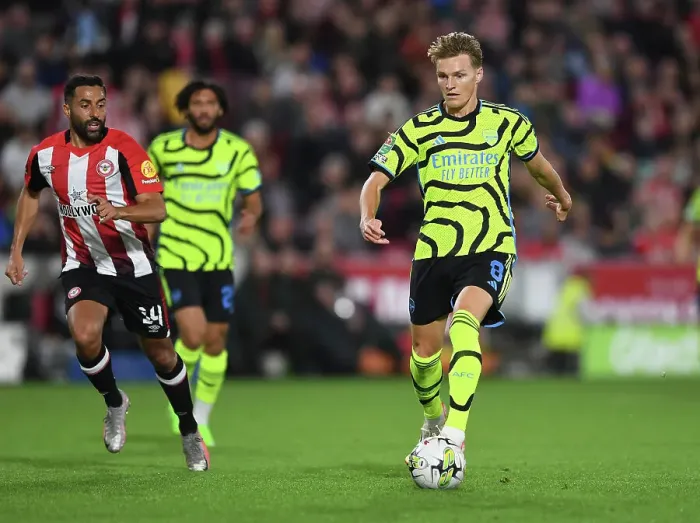 Framed Print : Arsenal's Martin Odegaard Shines in Carabao Cup Clash Against Brentford Framed Print : Arsenal's Martin Odegaard Shines in Carabao Cup Clash Against Brentford