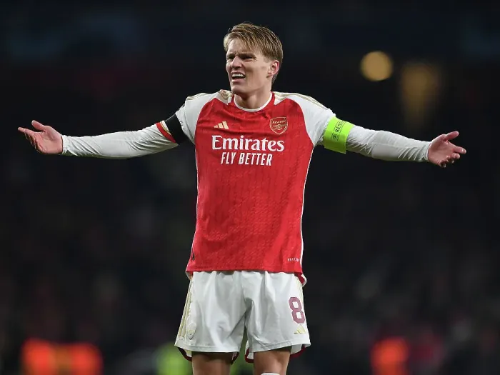 Framed Print : Arsenal's Martin Odegaard Shines in Champions League Clash Against RC Lens