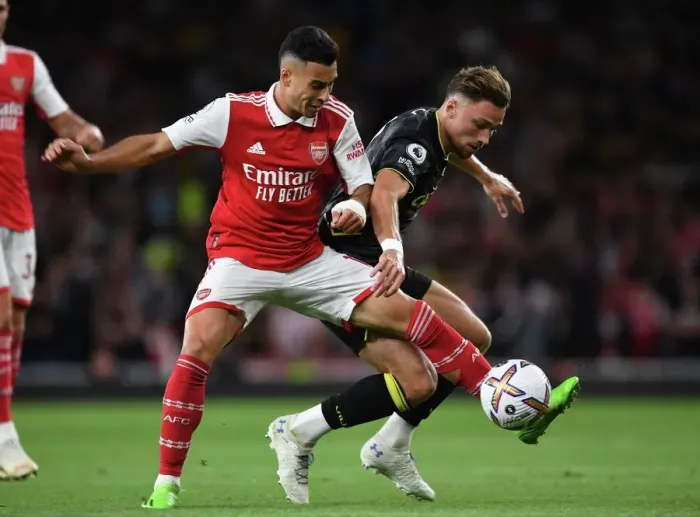 Framed Print : Arsenal's Martinelli Clashes with Aston Villa's Cash in 2022-23 Premier League Showdown Framed Print : Arsenal's Martinelli Clashes with Aston Villa's Cash in 2022-23 Premier League Showdown
