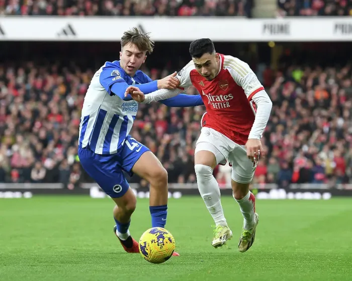 Framed Print : Arsenal's Martinelli Clashes with Brighton's Hinshelwood in 2023-24 Premier League Showdown Framed Print : Arsenal's Martinelli Clashes with Brighton's Hinshelwood in 2023-24 Premier League Showdown