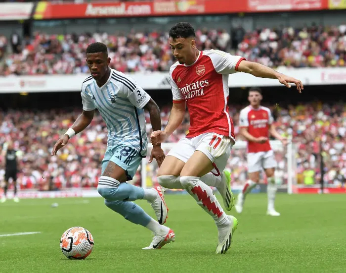 Framed Print : Arsenal's Martinelli Clashes with Forest's Danilo in 2023-24 Premier League Showdown Framed Print : Arsenal's Martinelli Clashes with Forest's Danilo in 2023-24 Premier League Showdown
