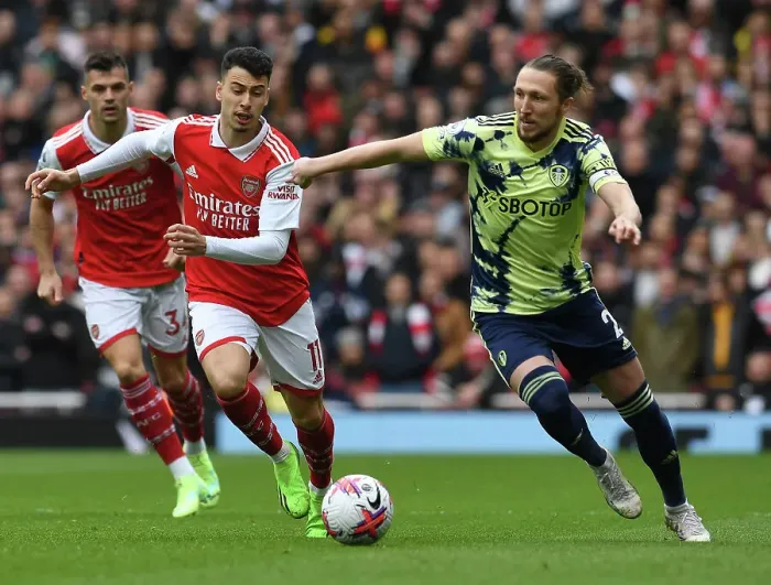 Framed Print : Arsenal's Martinelli Clashes with Leeds Ayling in Premier League Showdown Framed Print : Arsenal's Martinelli Clashes with Leeds Ayling in Premier League Showdown
