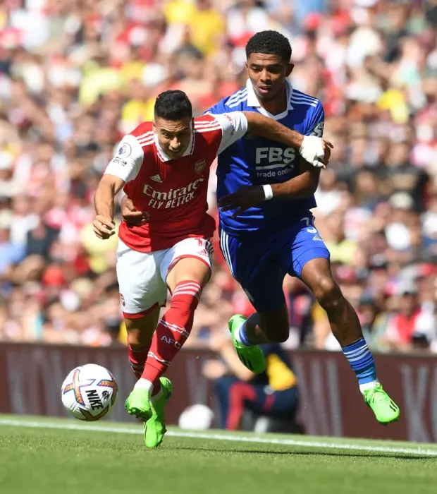 Framed Print : Arsenal's Martinelli Clashes with Leicester's Fofana in 2022-23 Premier League Showdown