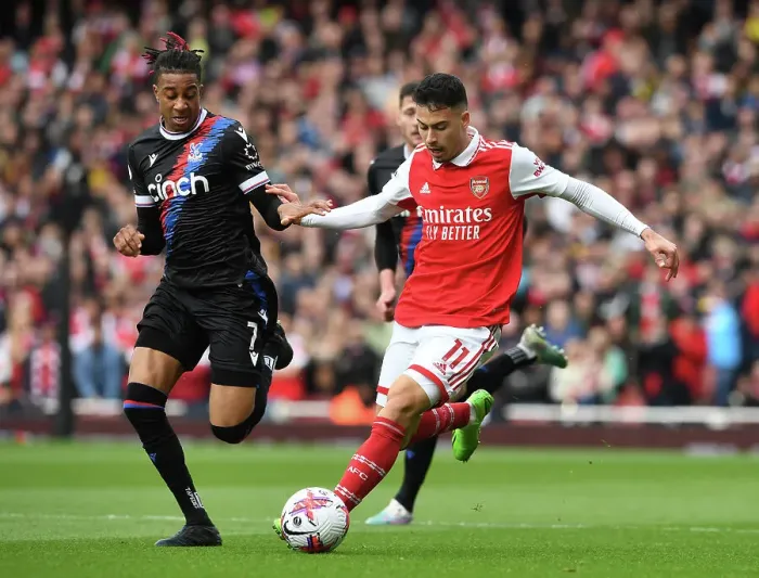 Framed Print : Arsenal's Martinelli Clashes with Palace's Olise in Premier League Showdown Framed Print : Arsenal's Martinelli Clashes with Palace's Olise in Premier League Showdown