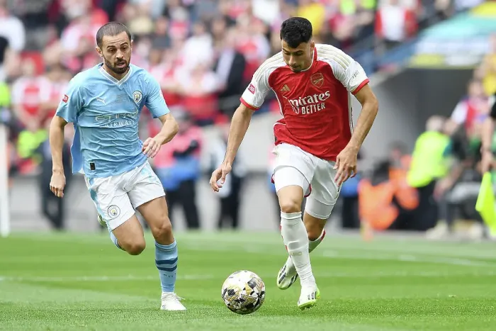 Framed Print : Arsenal's Martinelli Faces Off Against Manchester City's Bernardo Silva in Community Shield Showdown