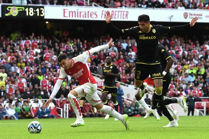 Framed Print : Arsenal's Martinelli Faces Off Against Monaco's Maripan in Emirates Cup Clash