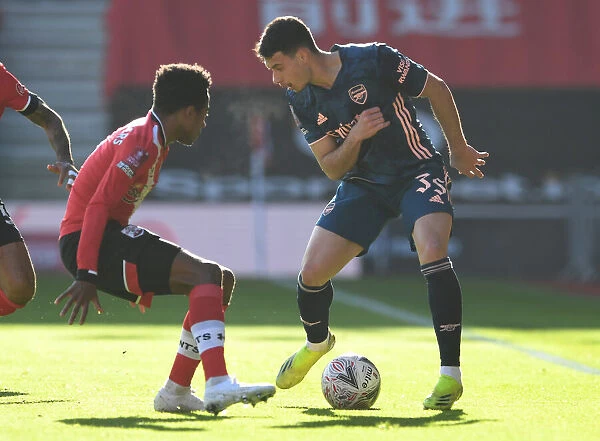 Arsenal's Martinelli Faces Southampton's Walker-Peters in FA Cup Clash Amid Empty Stands