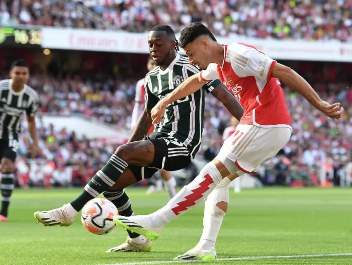 Framed Print : Arsenal's Martinelli Fires Against Manchester United in 2023-24 Premier League Clash Framed Print : Arsenal's Martinelli Fires Against Manchester United in 2023-24 Premier League Clash