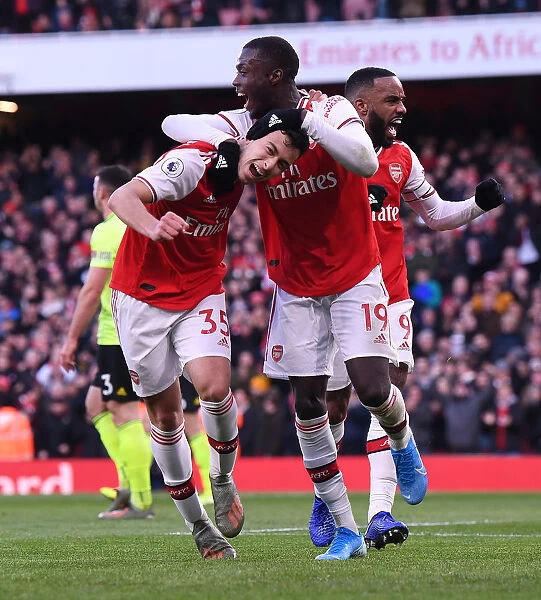 Arsenal's Martinelli, Lacazette, and Pepe Celebrate Goal Against Sheffield United (2019-20)