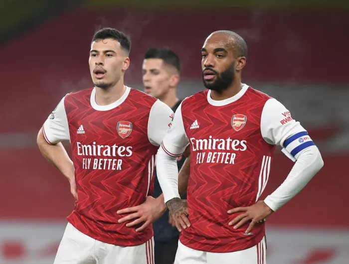Framed Print : Arsenal's Martinelli and Lacazette in Action: Carabao Cup Quarterfinal vs Manchester City at Empty Emirates Stadium