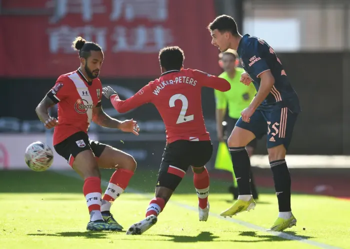 Framed Print : Arsenal's Martinelli Navigates Past Southampton: FA Cup 4th Round Clash Amidst Empty Stands