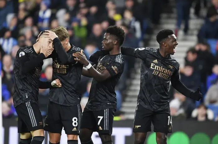 Framed Print : Arsenal's Martinelli, Odegaard, Saka, and Nketiah: Celebrating a Win Against Brighton Framed Print : Arsenal's Martinelli, Odegaard, Saka, and Nketiah: Celebrating a Win Against Brighton