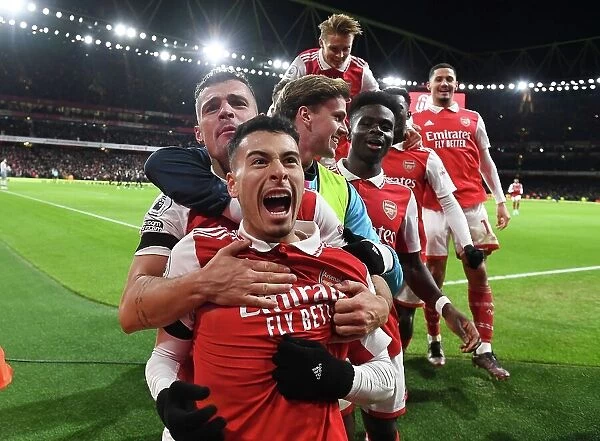 Arsenal's Martinelli Scores Second Goal Against West Ham, Celebrates with Xhaka, Holding, and Saka