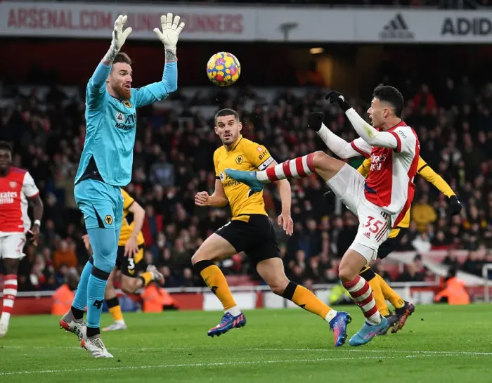Framed Print : Arsenal's Martinelli Tries to Outwit Wolves Sa in Premier League Clash