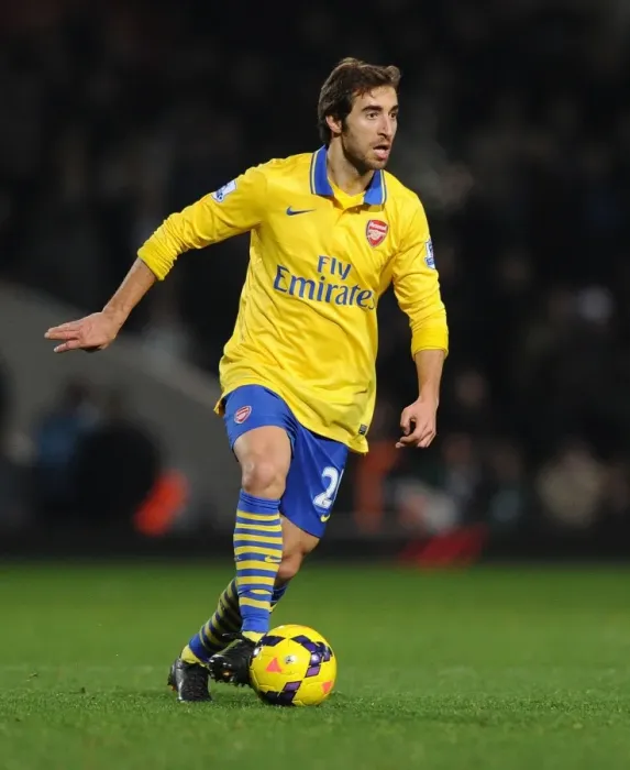 Framed Print : Arsenal's Mathew Flamini in Action: Premier League Battle against West Ham United (December 2013)