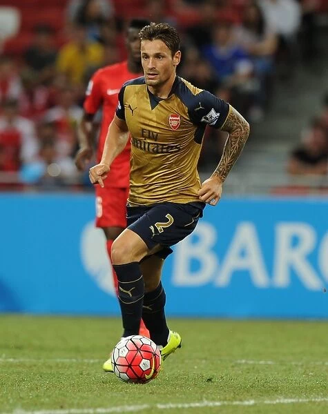 Arsenal's Mathieu Debuchy in Action against Singapore XI at Singapore National Stadium