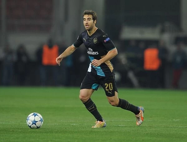 Arsenal's Mathieu Flamini in Action against Olympiacos (December 2015, UEFA Champions League)
