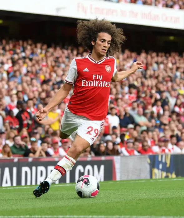 Framed Print : Arsenal's Matteo Guendouzi in Action Against Tottenham Hotspur in the 2019-20 Premier League