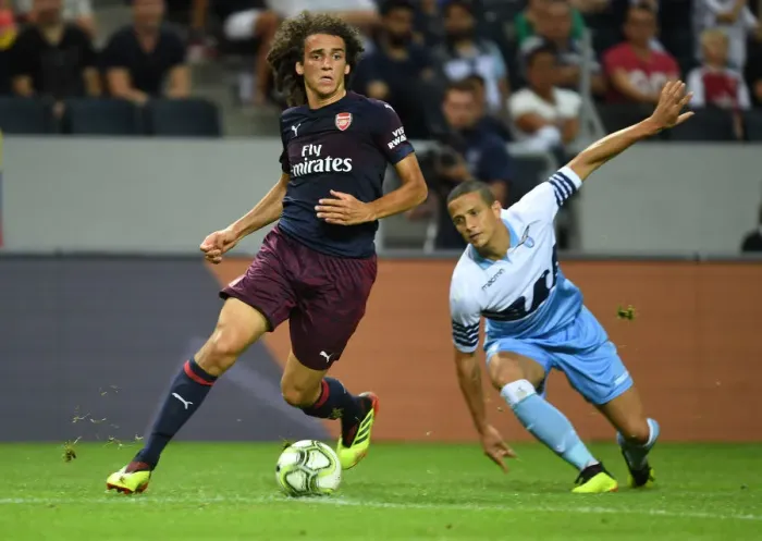 Framed Print : Arsenal's Matteo Guendouzi Outmaneuvers Lazio's Luiz Felipe in Stockholm Friendly
