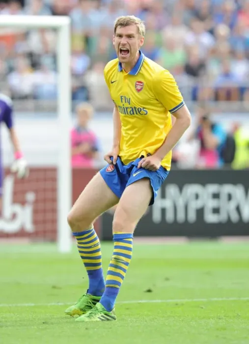 Framed Print : Arsenal's Per Mertesacker in Action against Manchester City in 2013 Pre-Season Friendly
