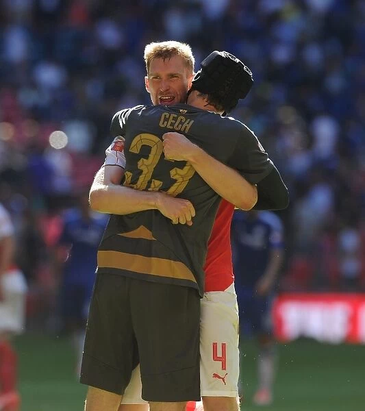 Arsenal's Mertesacker and Cech Celebrate FA Community Shield Victory over Chelsea
