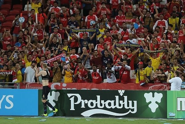 Arsenal's Per Mertesacker Celebrates Victory with Arsenal Fans in Singapore, 2015